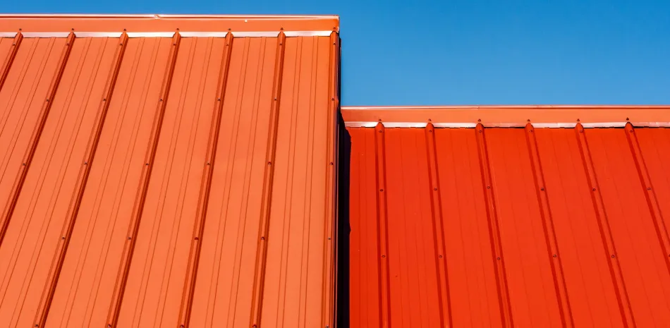 Orange and red roofs against the blue sky in Mooresville, NC